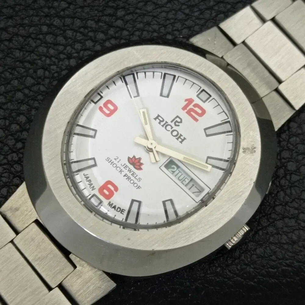 Vintage 1972 Ricoh Automatic Mens Silver Watch W/daydate & Red accents